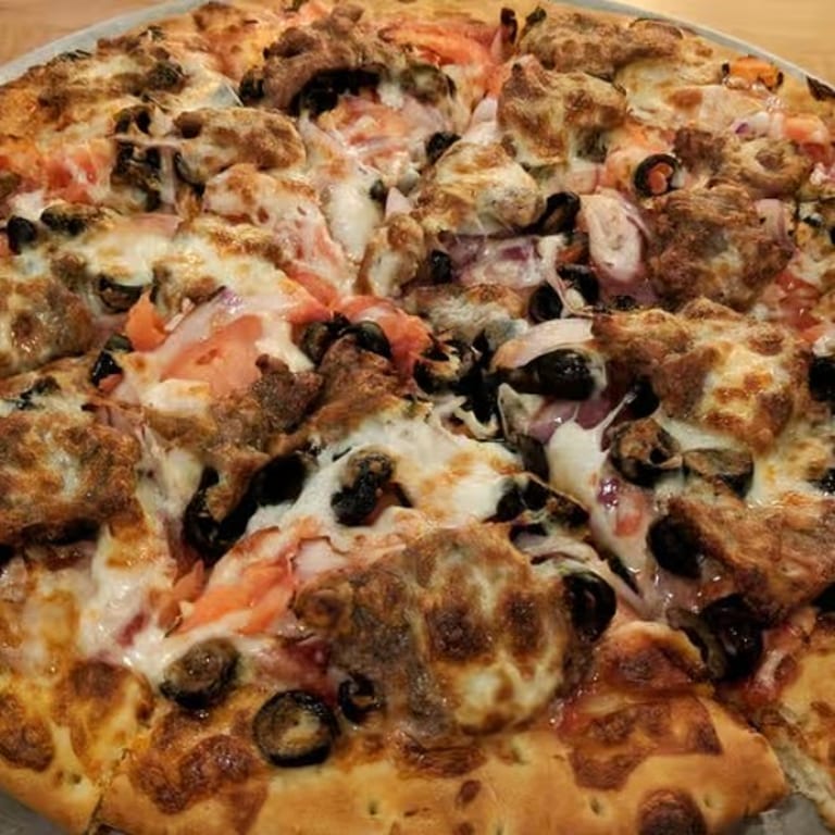 Delicious Greek Pizza Awaits