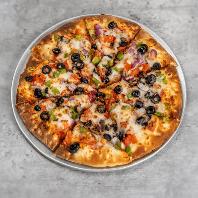 21. Vegetarian Pizza (12" Medium).